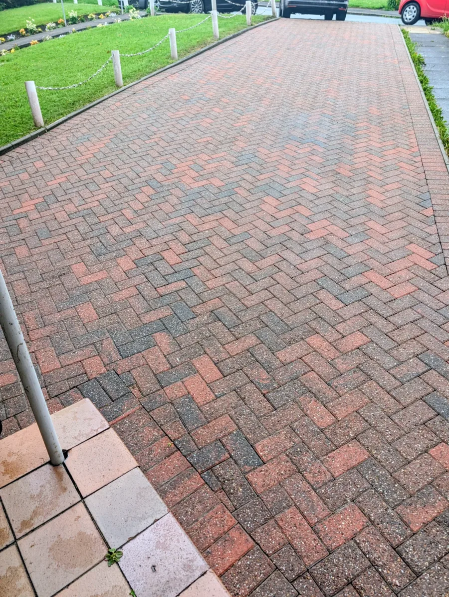 The same front block-paved driveway after cleaning