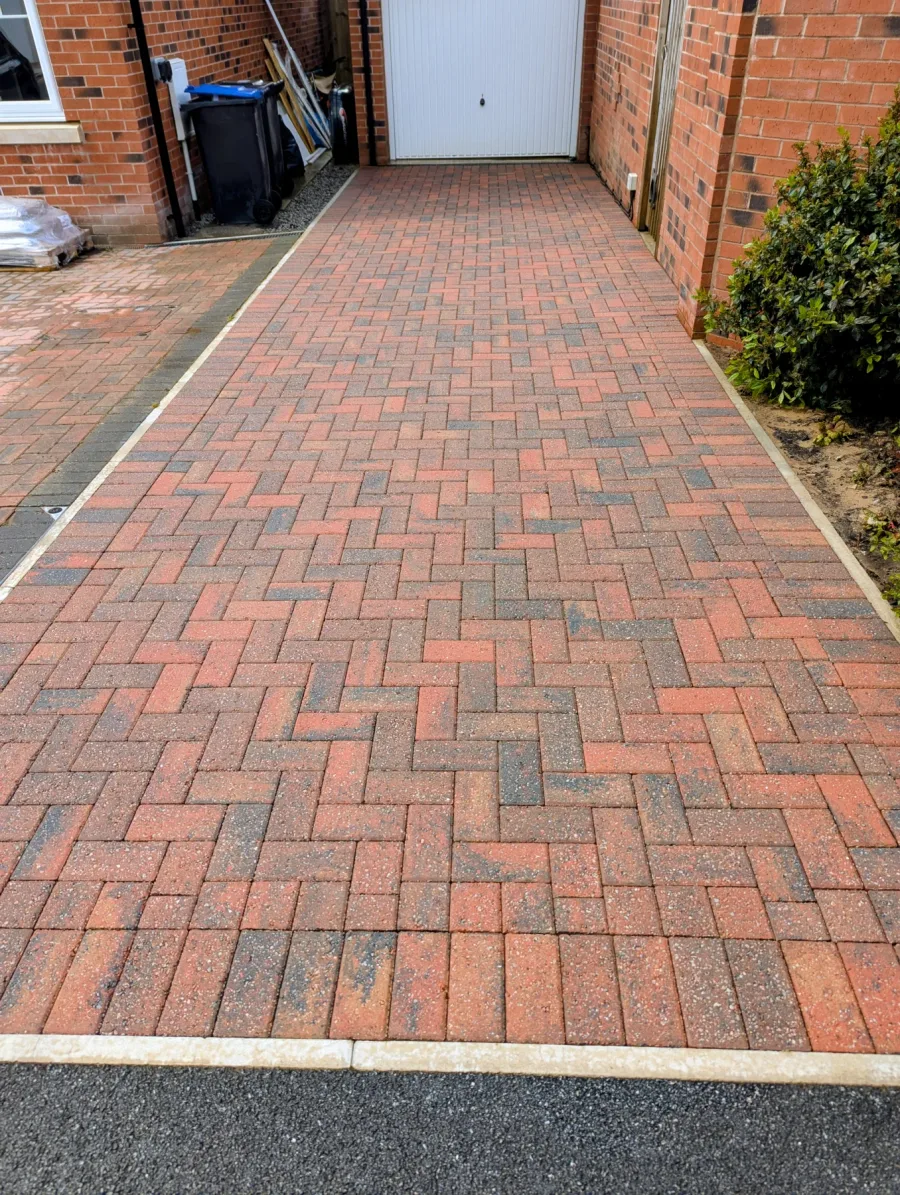 The block-paved driveway after rotary surface cleaning