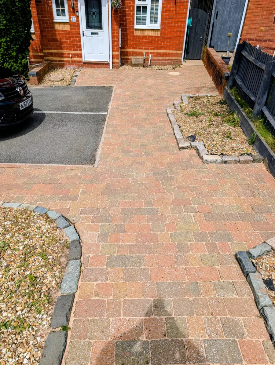 The same front garden path after cleaning